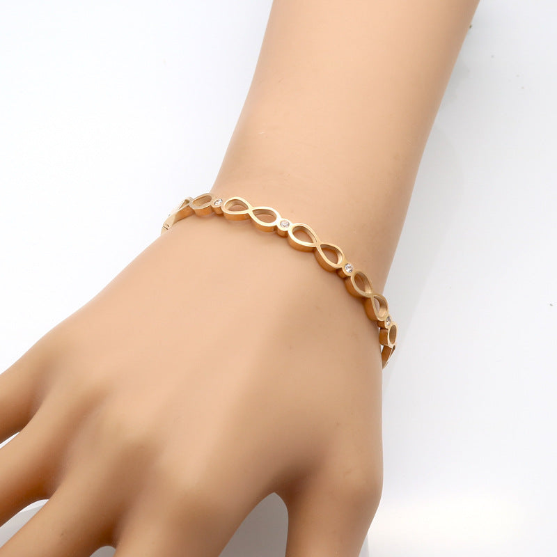 New simple and fashionable stainless steel diamond-encrusted hollow 8-character bracelet